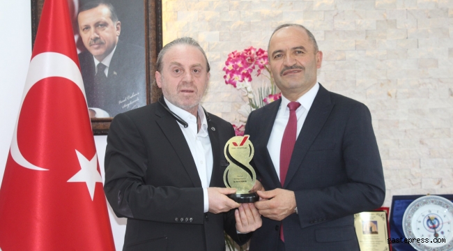 BAŞKAN COŞKUN'A ÖDÜL