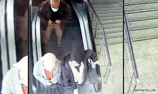 Genç kızın montundan telefonu alarak cebine koydu!