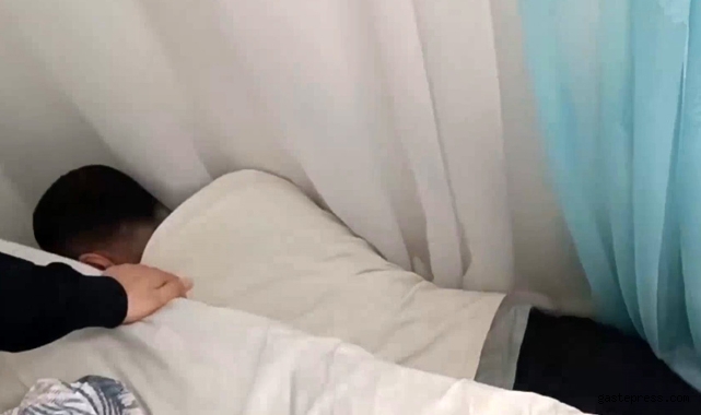 Yakalanmamak için baza ile duvar arasına saklandı!