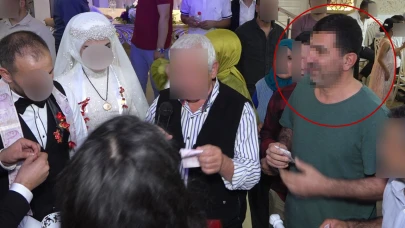 Davetsiz düğüne gitti, pasta yedi, takılan paraları çaldı!