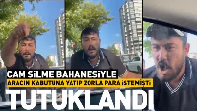 Cam silme bahanesiyle aracın kaputuna yatıp zorla para istemişti, tutuklandı!