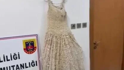 Gelinliğin üzerine boncuk şeklinde işlenmiş 25 kilo uyuşturucu ele geçirildi!